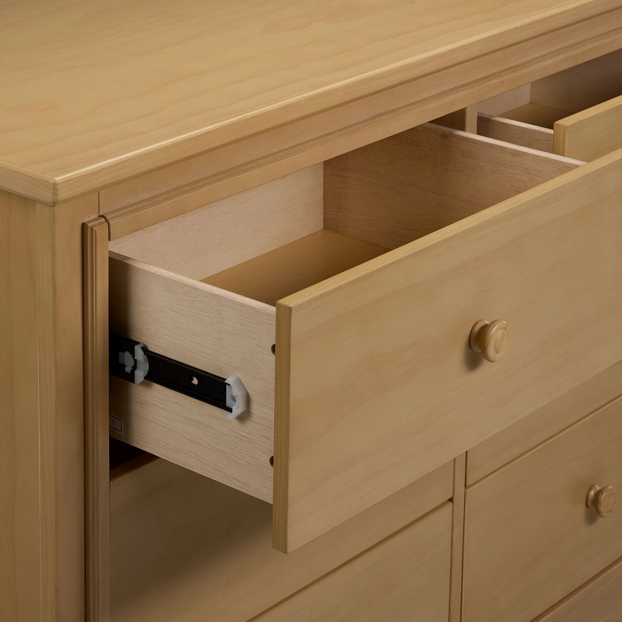 Delta Children Taylor 6 Drawer Dresser - Natural Sandstone - Image 3